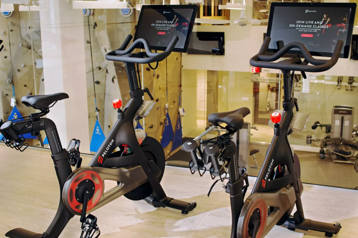 Two Peloton® bikes in the balcony level of the fitness center at Union Place